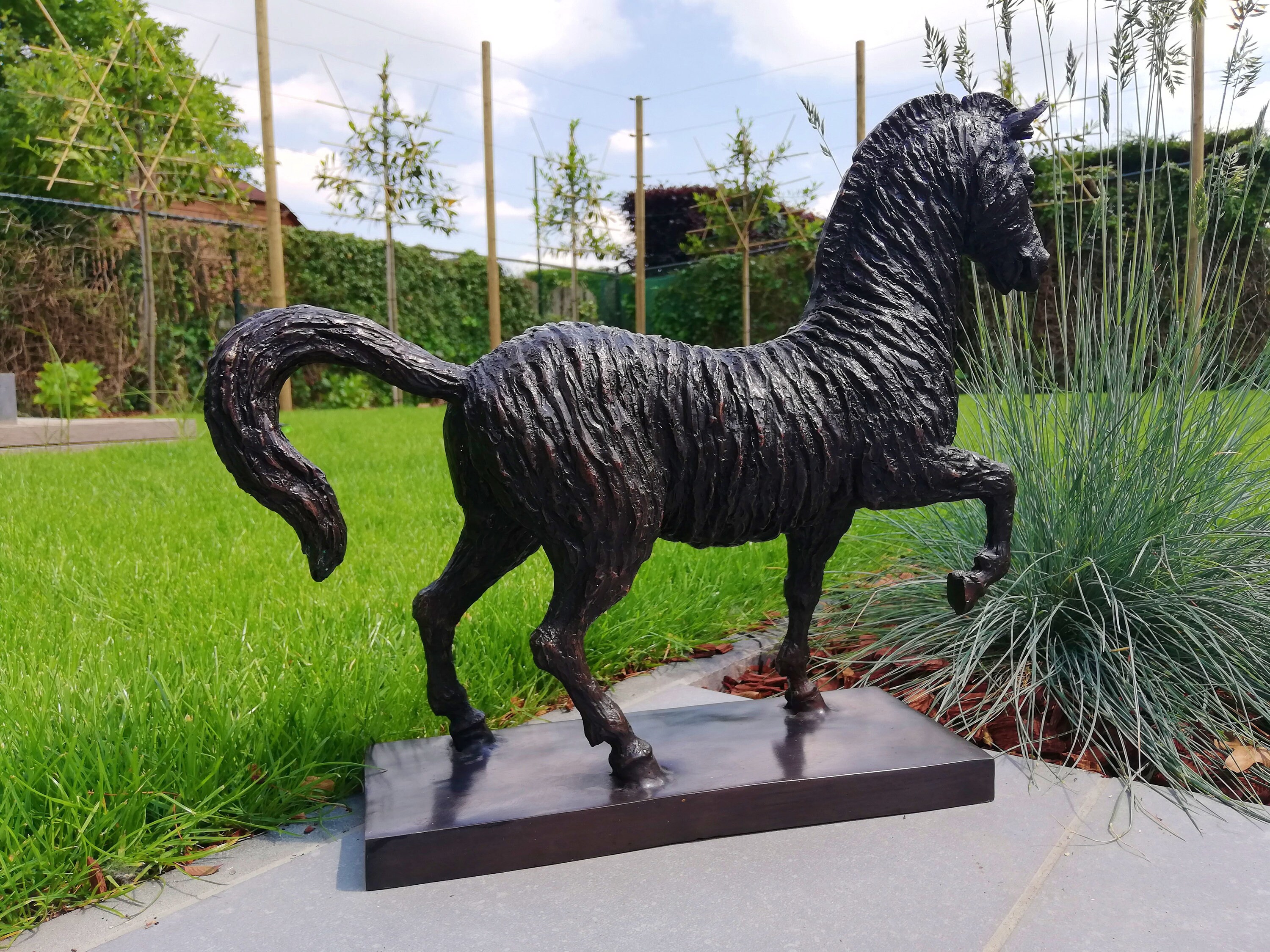 Bronze garden sculpture of a horse