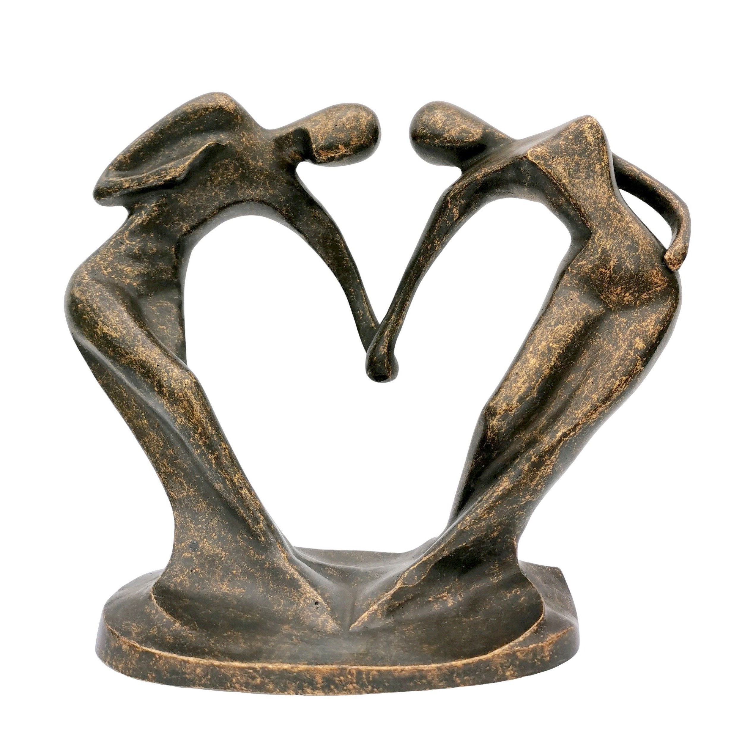 A bronze sculpture of an couple holding hands