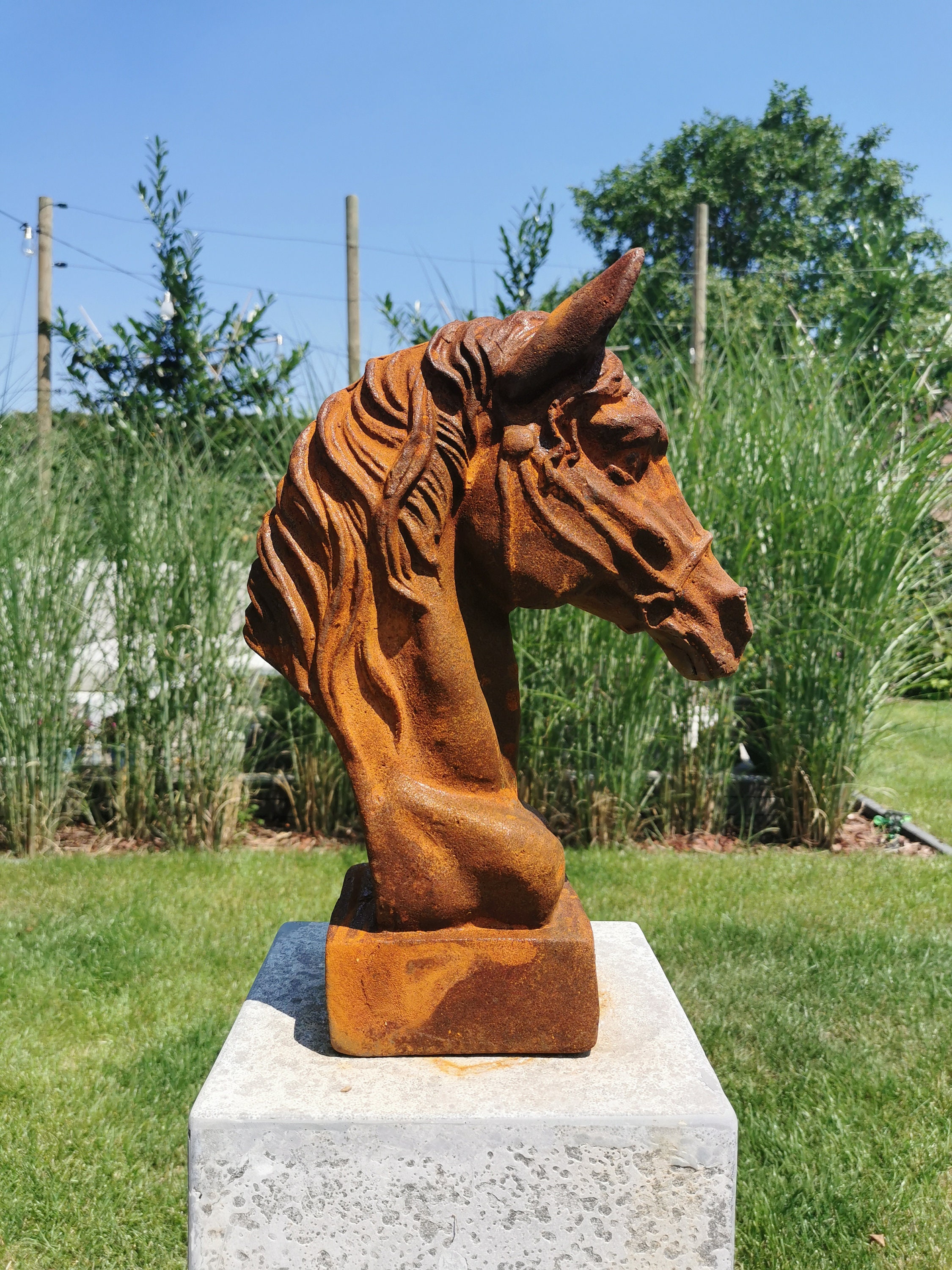 Antique style garden sculpture of a horse head Garden decor