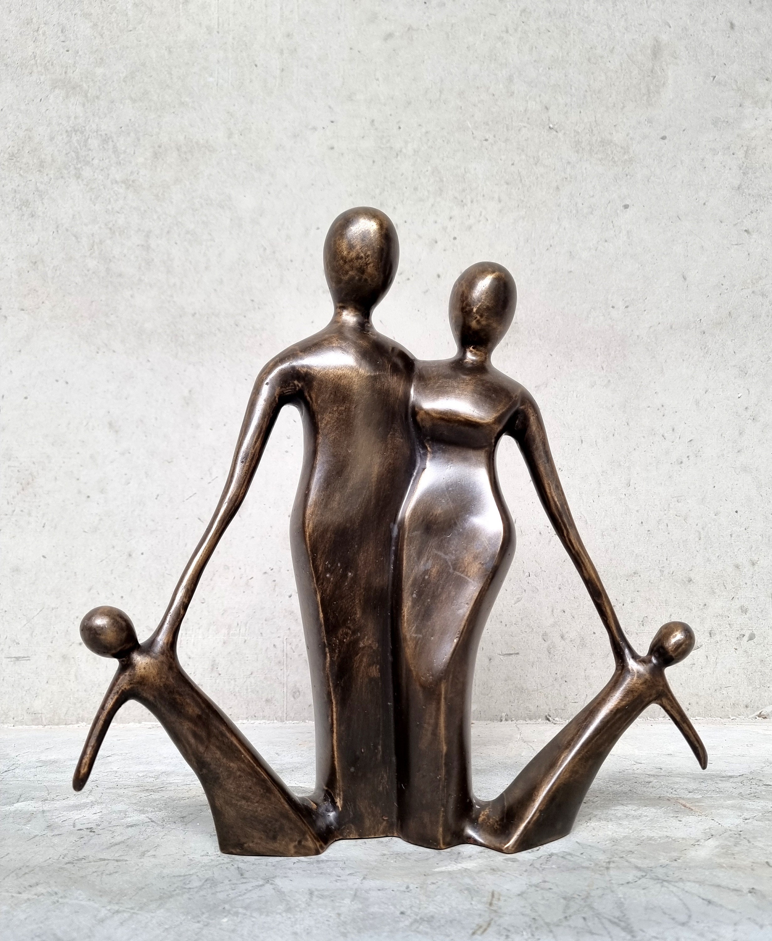 Bronze Sculpture of a Family Family of 4 Mother Father and 2