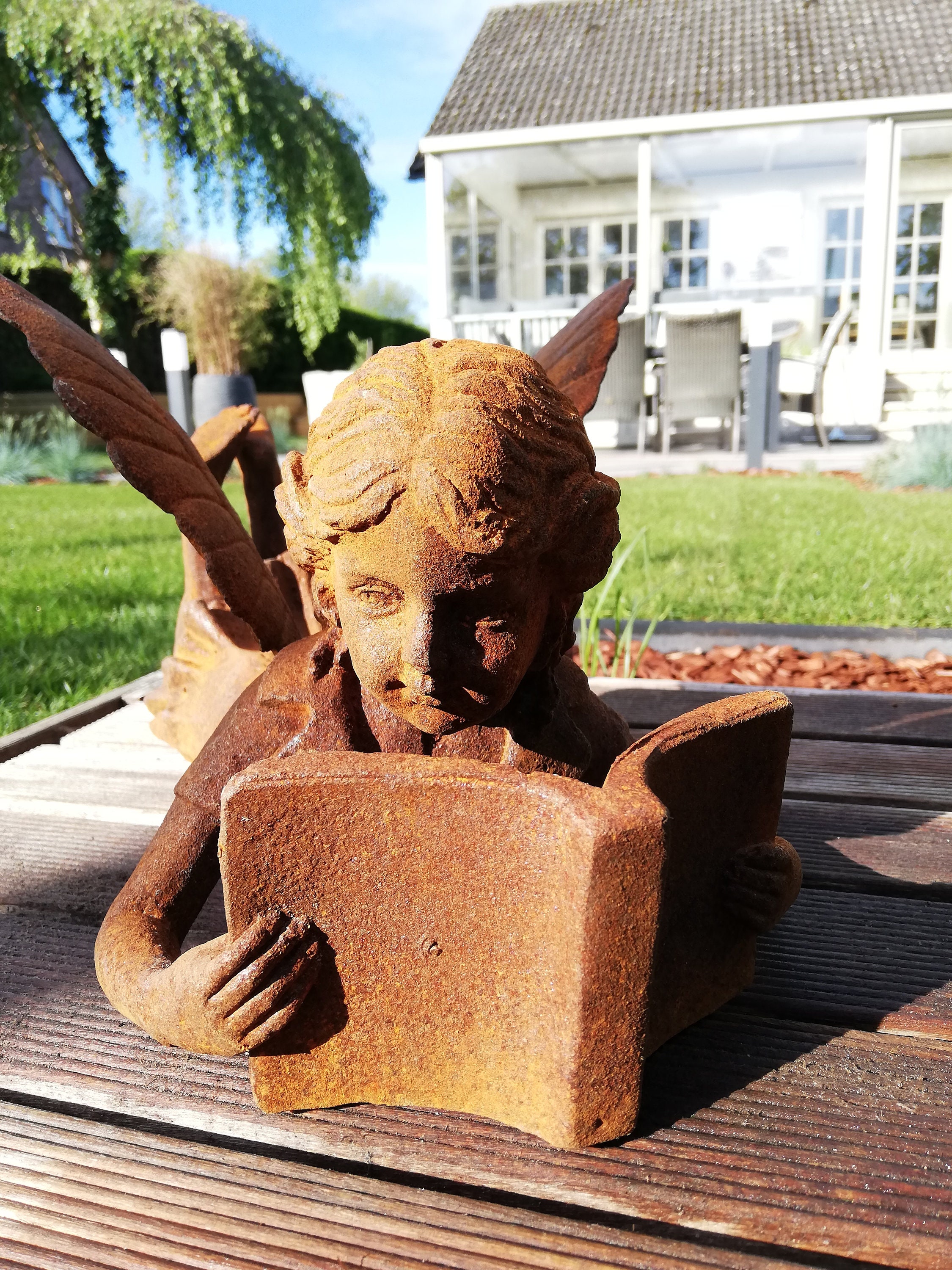 fairy reading a book statue