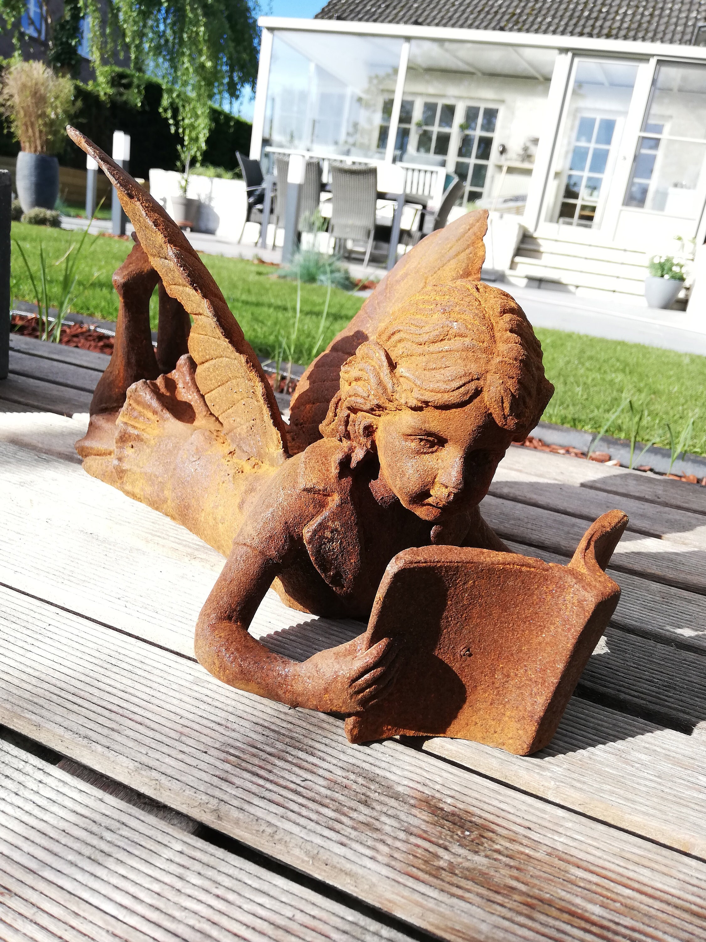 fairy reading a book statue