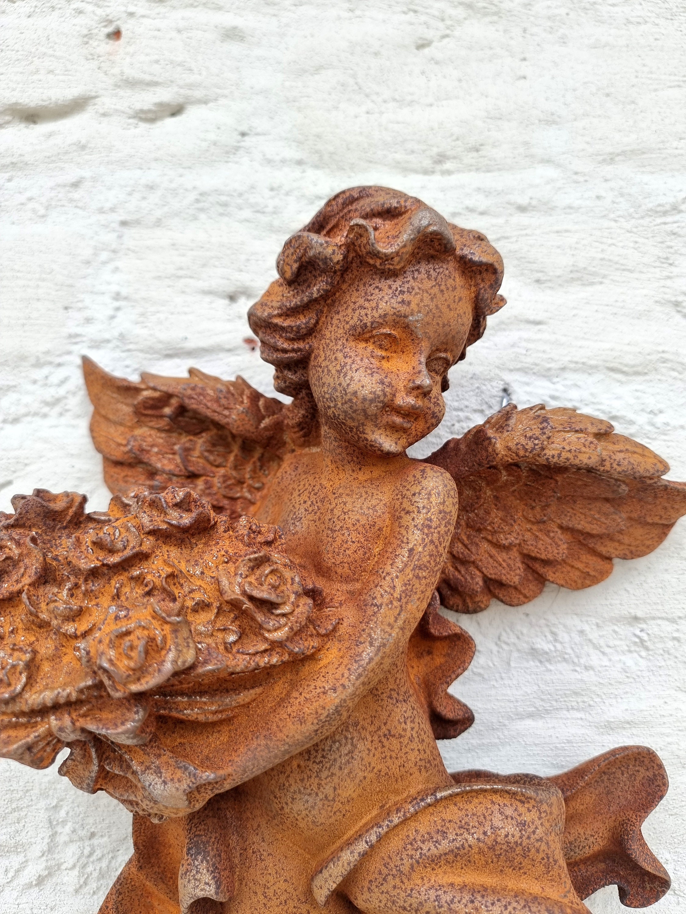 Cast iron wall sculpture of an Angel Cherub Christmas wall