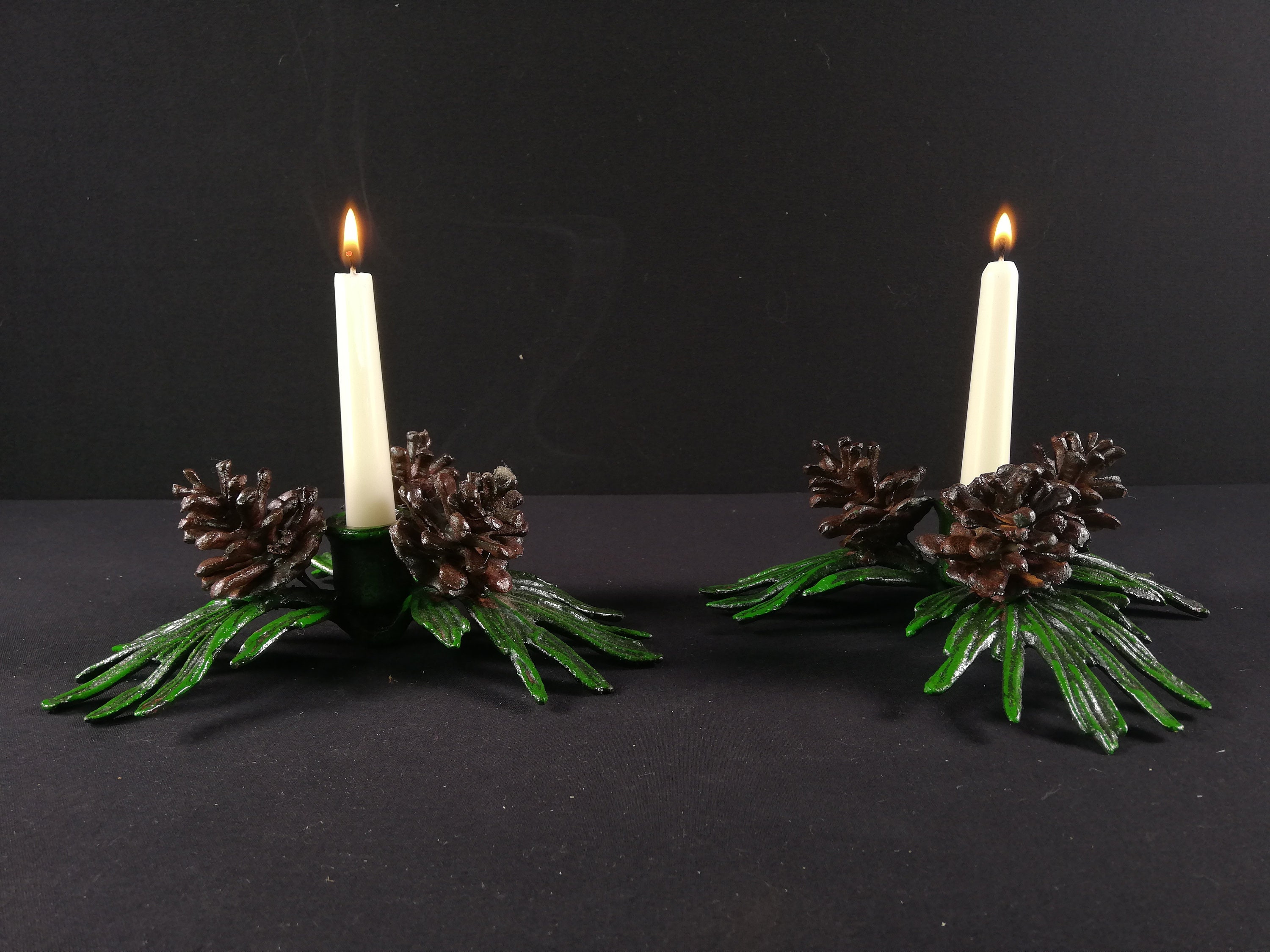 A pair of candlesticks winter theme Christmas candlesticks