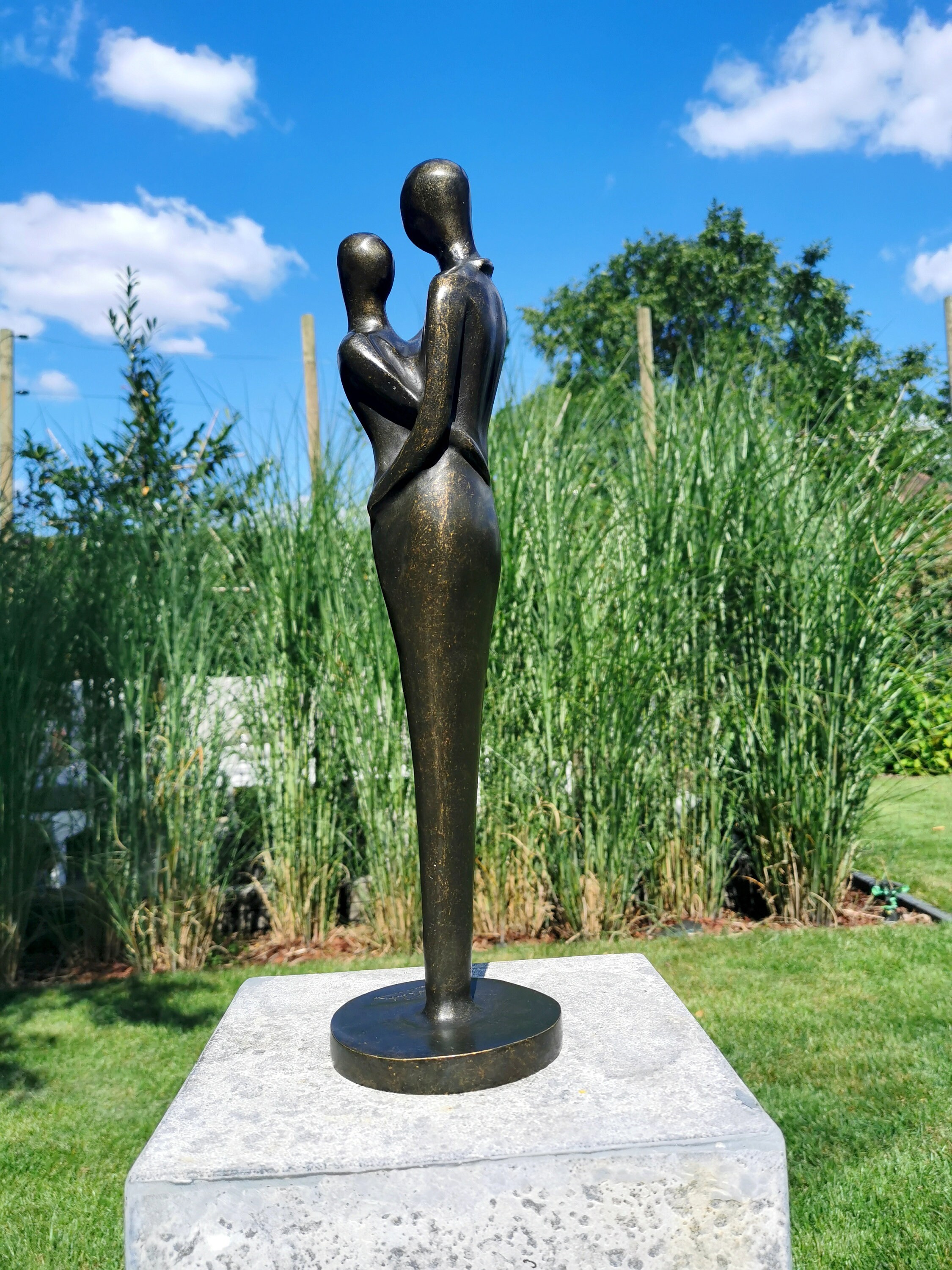Garden sculpture Bronze Embracing couple Modern garden art