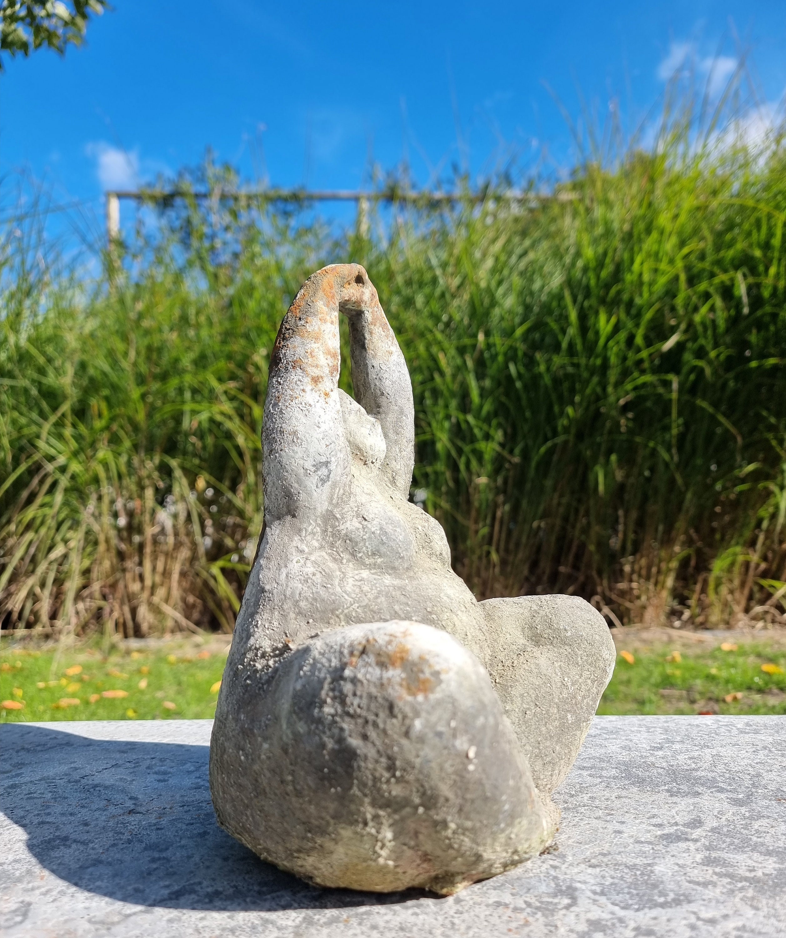 Sculpture of a dreaming lady Garden sculpture
