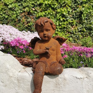 Sculpture de jardin en fonte d’un ange (garçon)