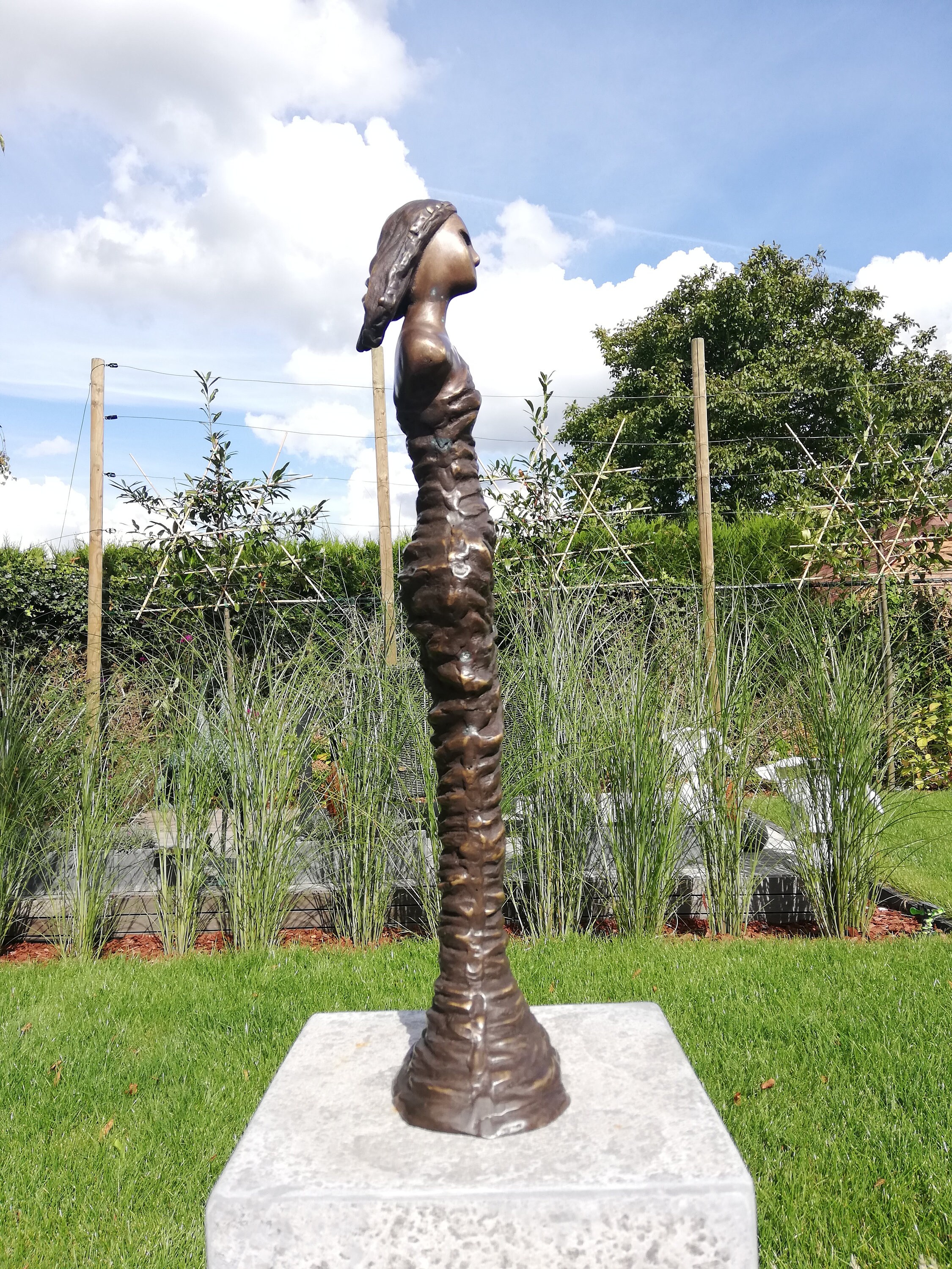 Modern bronze garden sculpture Standing woman