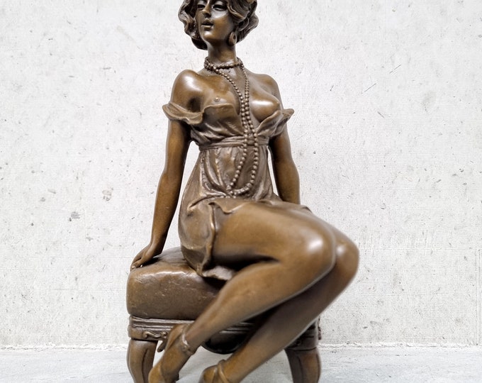 Sensual bronze sculpture of a half-naked woman sitting on a stool - Graceful bronze