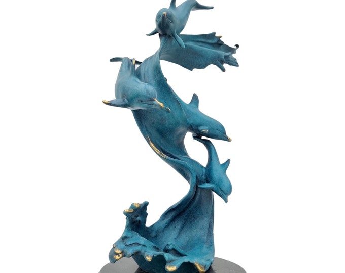 A bronze sculpture of swimming dolphins - Dolphins in the sea - Bronze fish