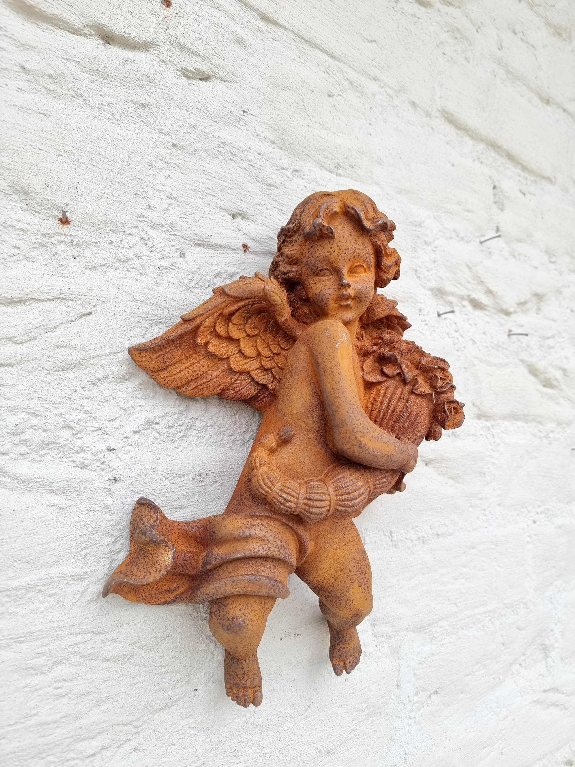 Cast iron wall sculpture of an Angel Cherub Christmas wall