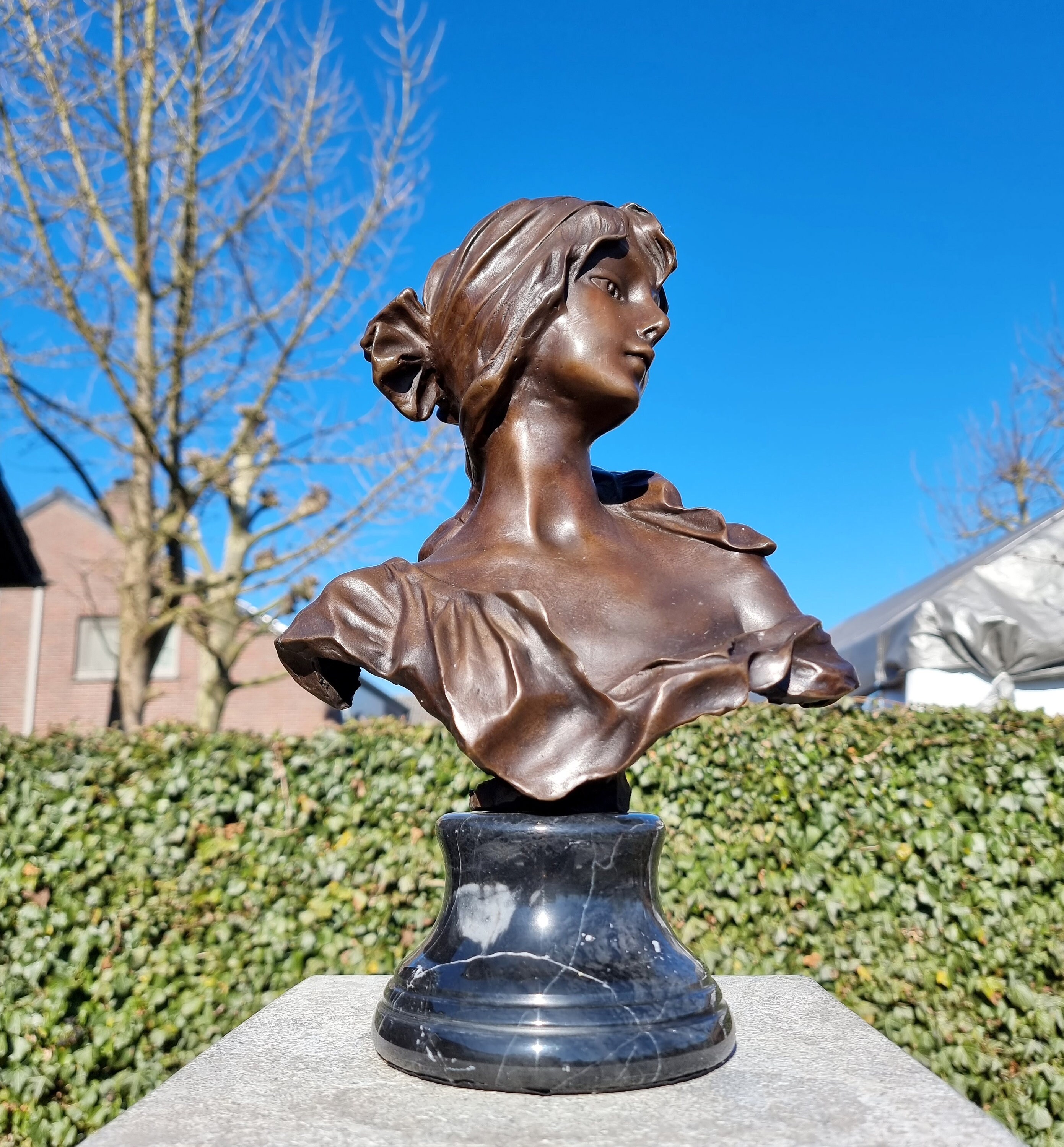 Classic bust on marble base Female bust in Art Deco style