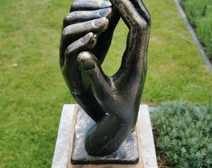 Cast iron sculpture - Embracing hands - Holding hands
