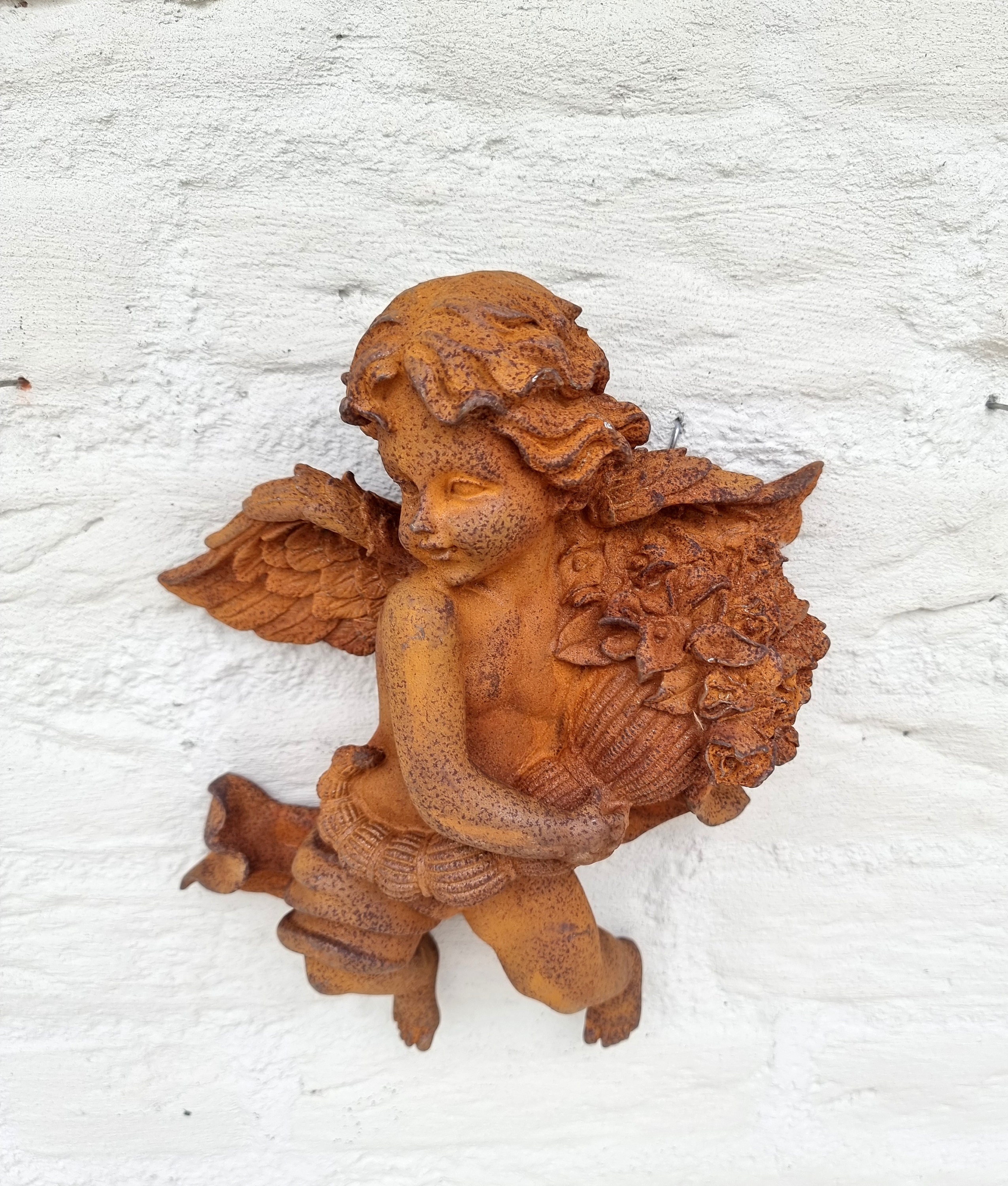 Cast iron wall sculpture of an Angel Cherub Christmas wall