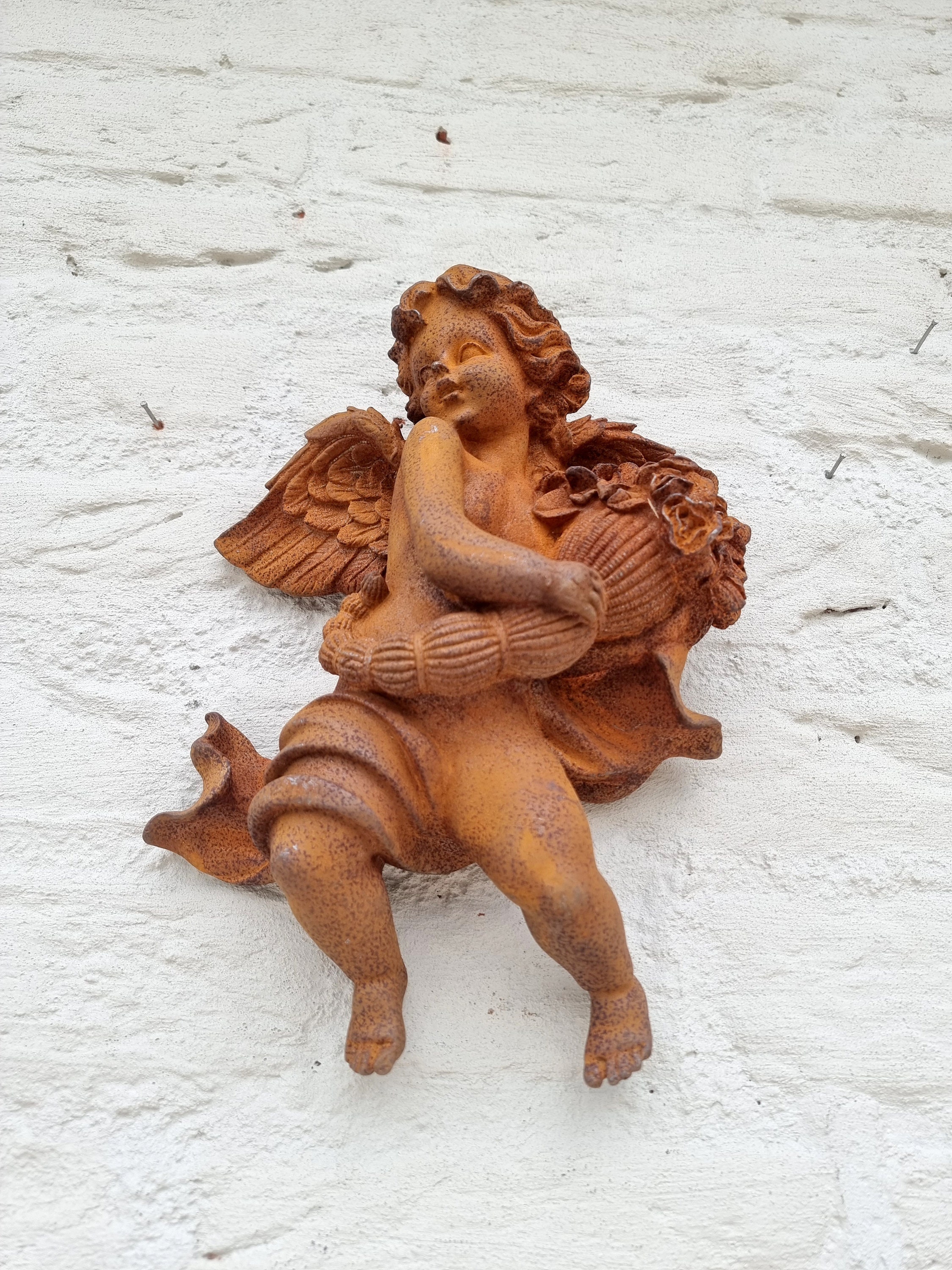Cast iron wall sculpture of an Angel Cherub Christmas wall