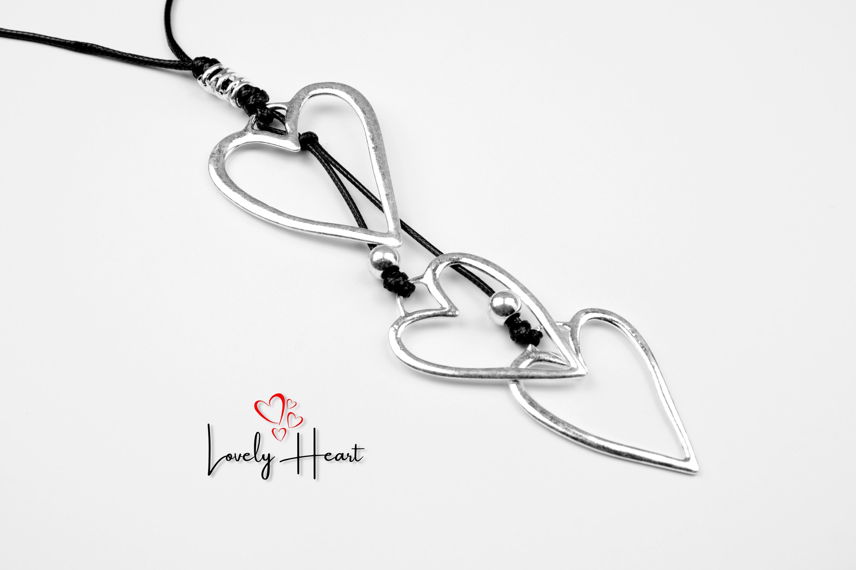 Three Hearts Pendants in Leather Cord Long Necklace by Lovely 