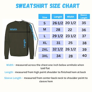 May include: A size chart for sweatshirts with measurements in inches. The chart shows the size, length, width, and sleeve length for sizes S through 3XL.