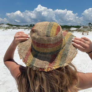 Beach Sun Protection Hemp Hat Natural Fiber Construction Rasta Color Scheme Handmade Design Summer Essential Accessory Festival Wear Option Bohemian Style Headwear Unisex Fashion Piece Red Yellow Green Pattern Sustainable Material Choice