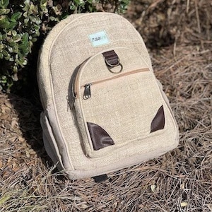 Himalayan Design Hemp Backpack Mini Rucksack Natural Fiber Construction Nepal Crafted Artisan Quality Sustainable Travel Daypack Eco Friendly Material Organic Fabric Small Size Everyday Carry Essential Adventure Companion Practical Compact