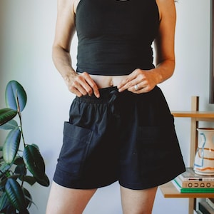 Women Hemp Shorts Organic Cotton Blend Sustainable Apparel Eco Friendly Fashion Elastic Waistband Relaxed Fit Comfortable Summer Casual Wear Loungewear Bottoms Black Mid Thigh Length Side Pockets Machine Washable Everyday Shorts Breathable