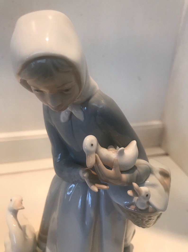 lladro shepherdess with ducks