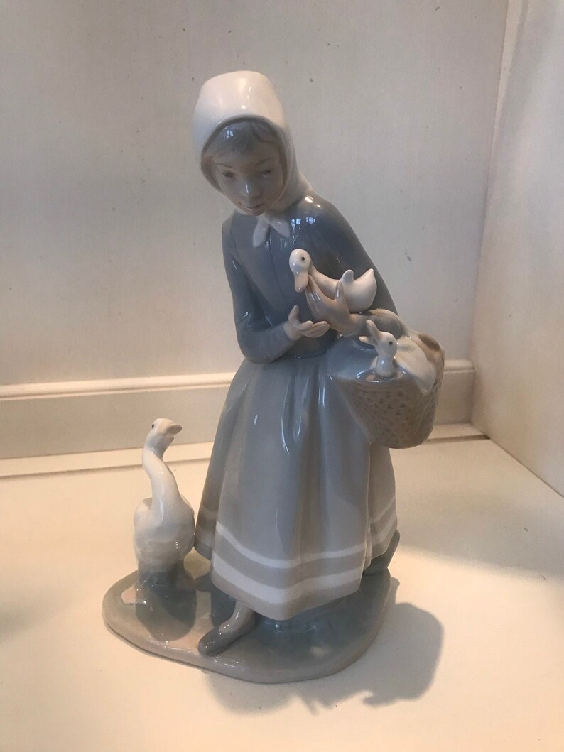 lladro shepherdess with ducks