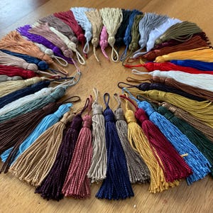 clearance sale certain colors tassels, tassels, pompoms 1.50 each