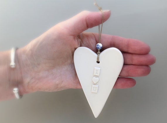 IRELAND FINE PORCELAIN CERAMIC HANGING ORNAMENT HEART HOME IS WHERE THE HEART IS IRELAND FINE PORCELAIN CERAMIC HANGING ORNAMENT HEART HOME IS WHERE THE HEART IS