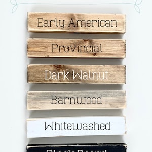 May include: Six wooden frame samples with different finishes: Early American, Provincial, Dark Walnut, Barnwood, Whitewashed, and Black Board.