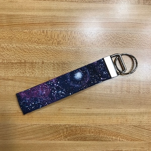 Llavero con estampado de galaxia, llavero de pulsera