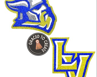May include: Two glittery iron-on patches featuring a blue and silver Viking mascot head and a yellow and blue LV monogram. A circular black logo with the text GRACED TO CREATE and a small orange tassel icon is positioned between the two patches.