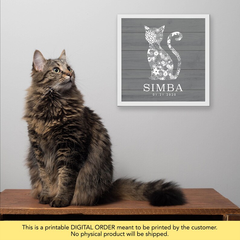May include: Printable digital art print featuring a gray wood background with a white floral cat silhouette. The cat is surrounded by a white border and the text "SIMBA 01.21.2020" is printed below the cat.