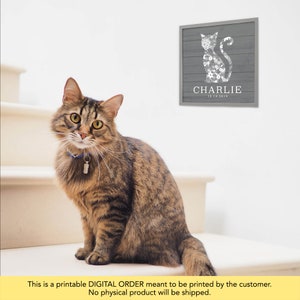 May include: Printable digital art print featuring a gray wood background with a white floral cat silhouette. The cat is surrounded by a white border and the text "CHARLIE 12.14.2019" is printed below the cat.
