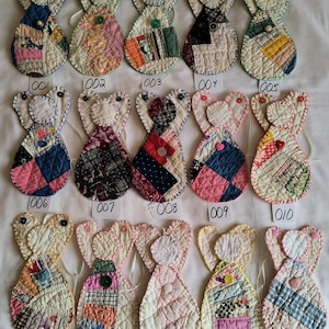 Quilted handmade angel ornaments made from repurposed vintage quilts that were unrepairable.