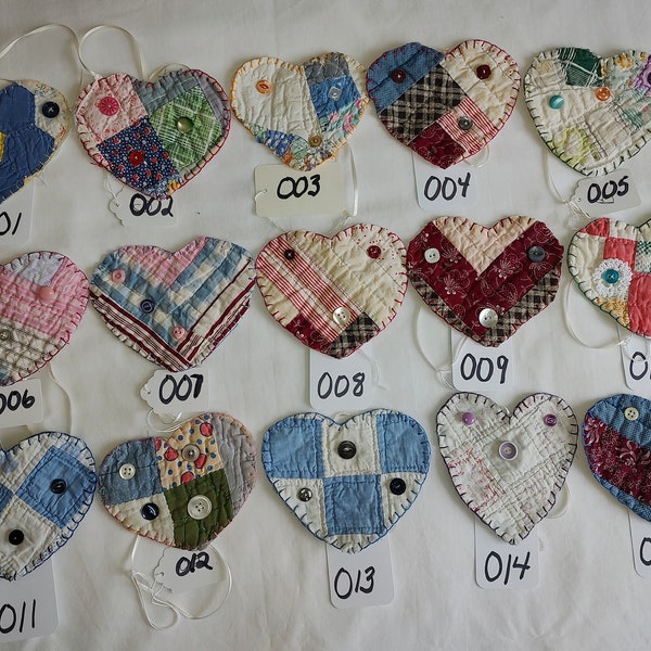 Valentine's Day or Christmas ornaments, made from  antique quilt scraps - double wedding ring and flower garden, patchwork, and more.