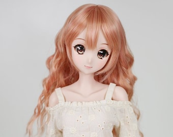 May include: A doll with long, wavy, light orange hair wearing a white off-the-shoulder top with a floral pattern and a red and black plaid skirt.