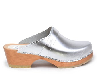 metallic silver clogs