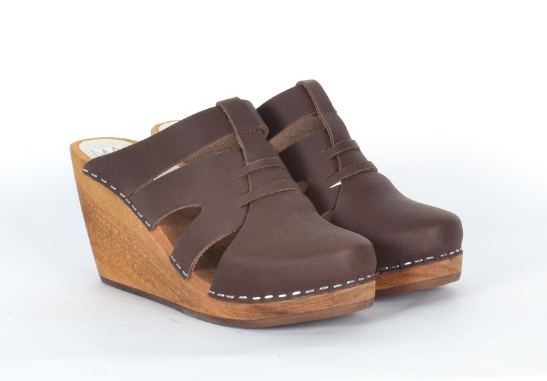 wedge heeled clogs