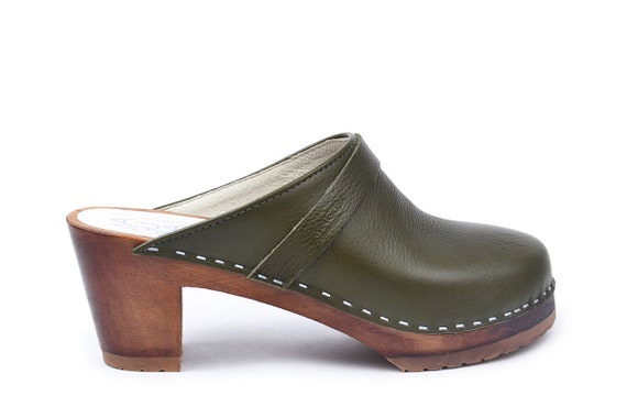 green leather clogs