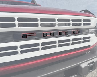 Tufskinz | Heritage Grille Letter Overlays - Fits 2023-2026 Bronco - 4 Piece Kit