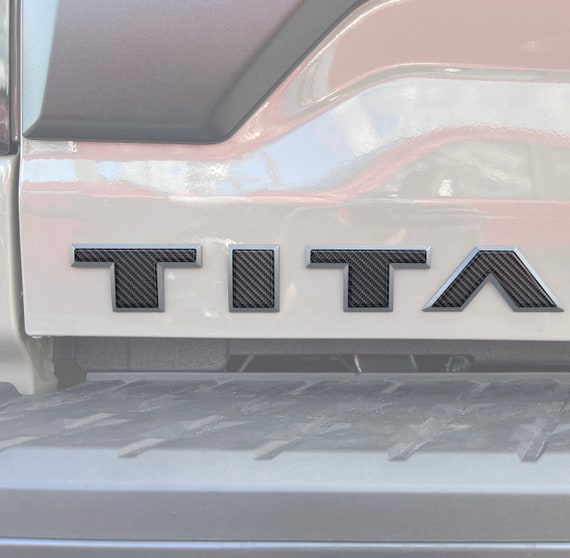 Tufskinz |  Tailgate Emblem Letter Overlays - Fits 2022-2026 Nissan Titan - 5 Piece Kit