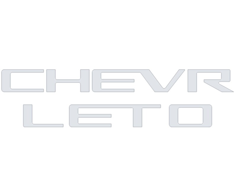 May include: A silver Chevrolet logo with the word "CHEVROLET" in a bold, sans-serif font.