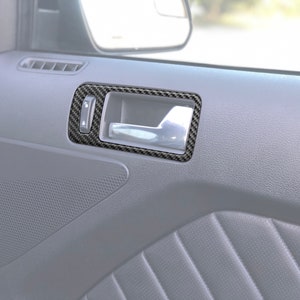 Tufskinz | Door Handle Surround Trim - Fits 2005-2014 Mustang - 2 Piece Kit