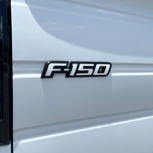 Tufskinz | Textured F-150 Tailgate Emblem Inserts - Fits 2009-2014 F-150 OEM Emblem - 5 Piece Kit