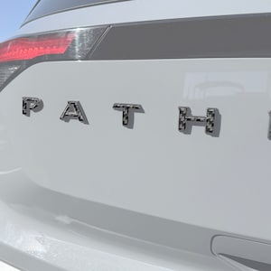 Tufskinz |  Rear Hatch Letter Overlays - Fits 2022-2025 Nissan Pathfinder - 10 Piece Kit