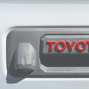 Tufskinz | Tailgate Handle Letter Overlays - Fits 2016-2023 Tacoma - 6 Piece Kit