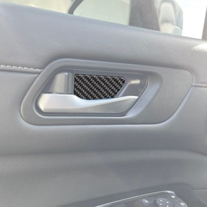 Tufskinz |  Front Door Trim Inserts - Fits 2022-2025 Nissan Pathfinder - 2 Piece Kit
