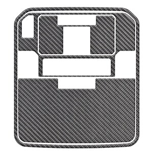 Peut inclure: Une garniture intérieure de voiture en fibre de carbone noire et grise. La garniture a une forme rectangulaire avec un bord blanc et des sections découpées. Le motif en fibre de carbone est visible.