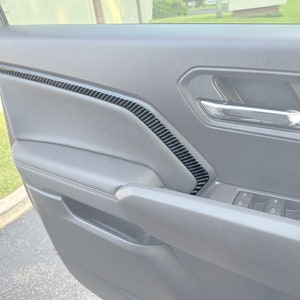 Tufskinz |  Armrest Accent Trim Fits 2023-2025 Chevrolet Colorado & GMC Canyon