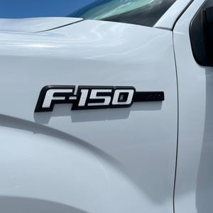 Tufskinz | Textured F-150 Side Emblem Inserts - Fits 2009-2014 F-150 OEM Emblem - 10 Piece Kit